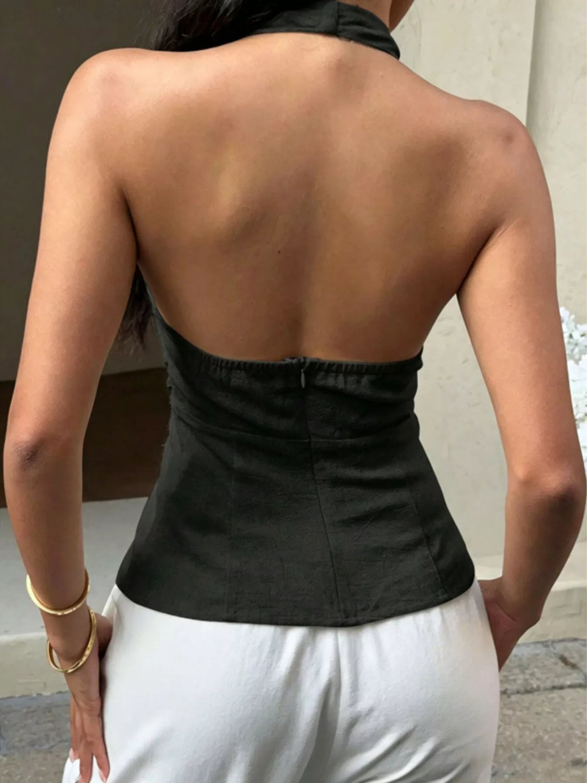 Black halter neck zip tank detail of the fabric