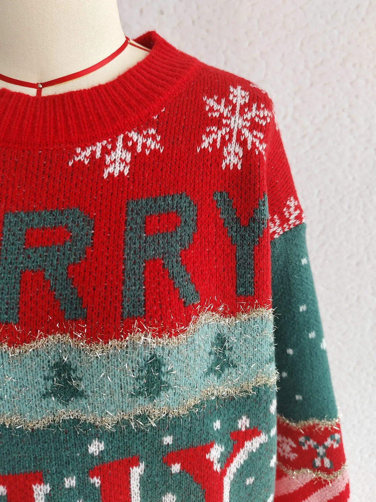 christmas letter round neck red sweater worn with denim