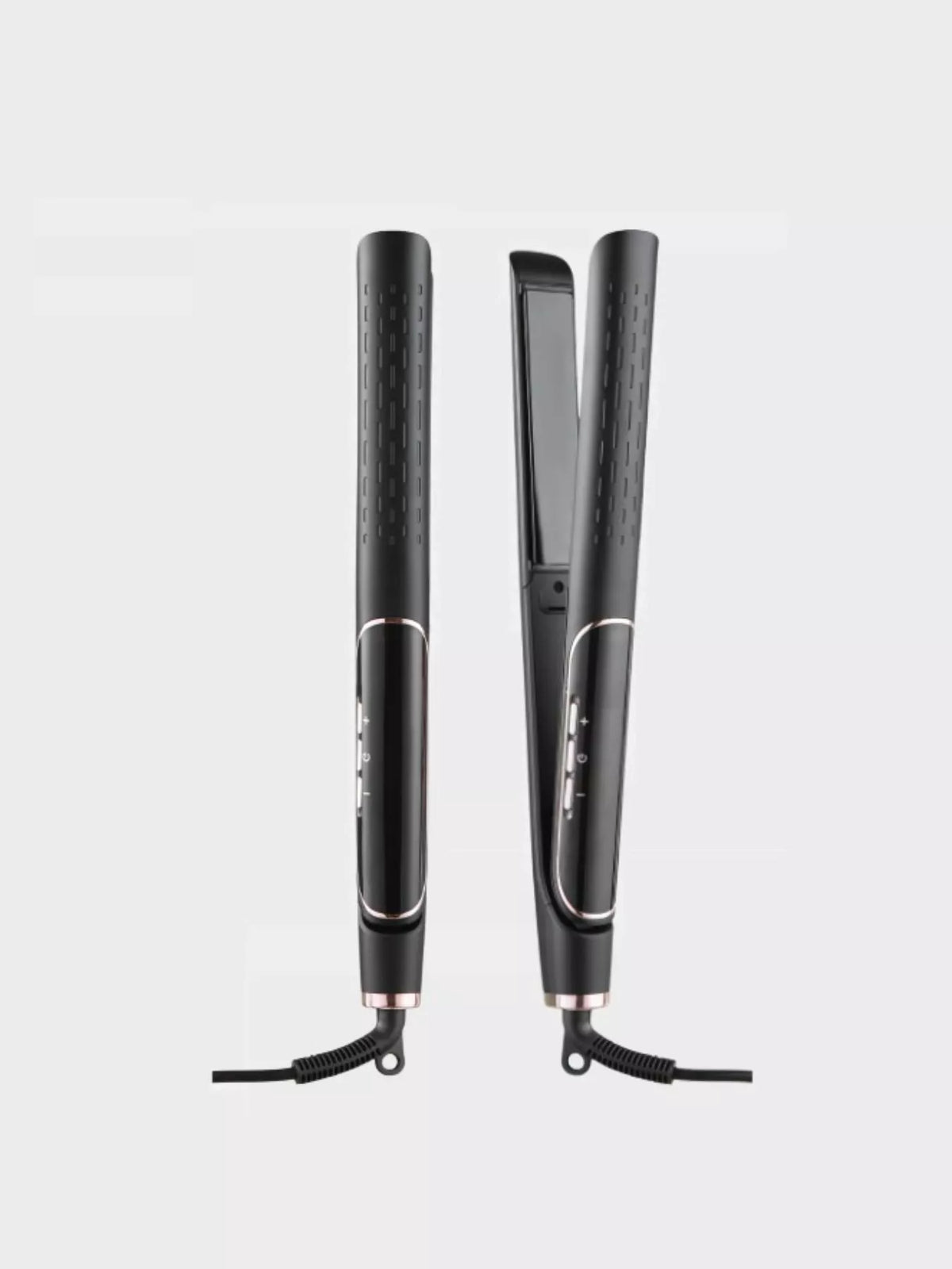Straightener smoothing a section of hair