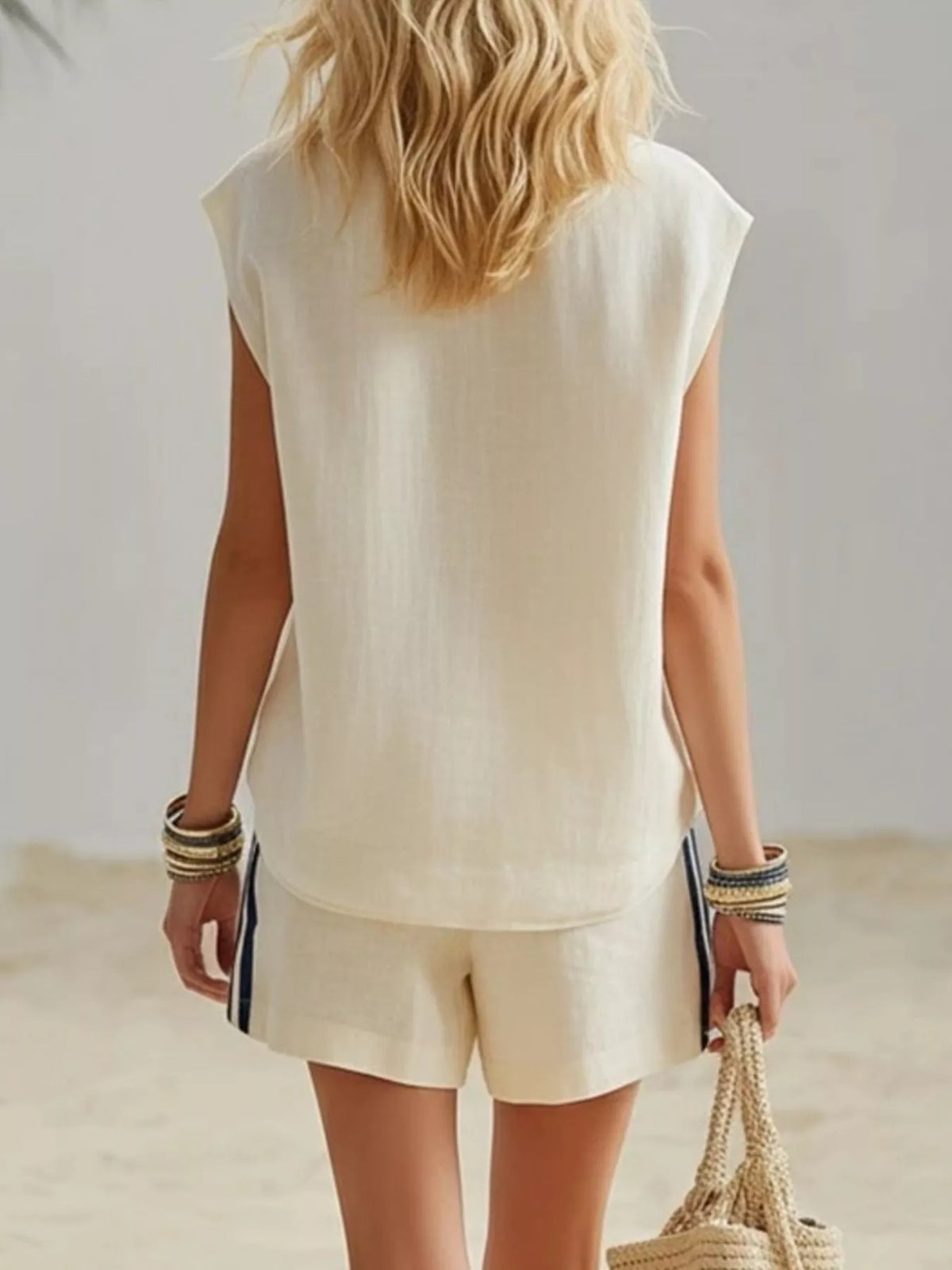 Zip front tank and striped shorts side view