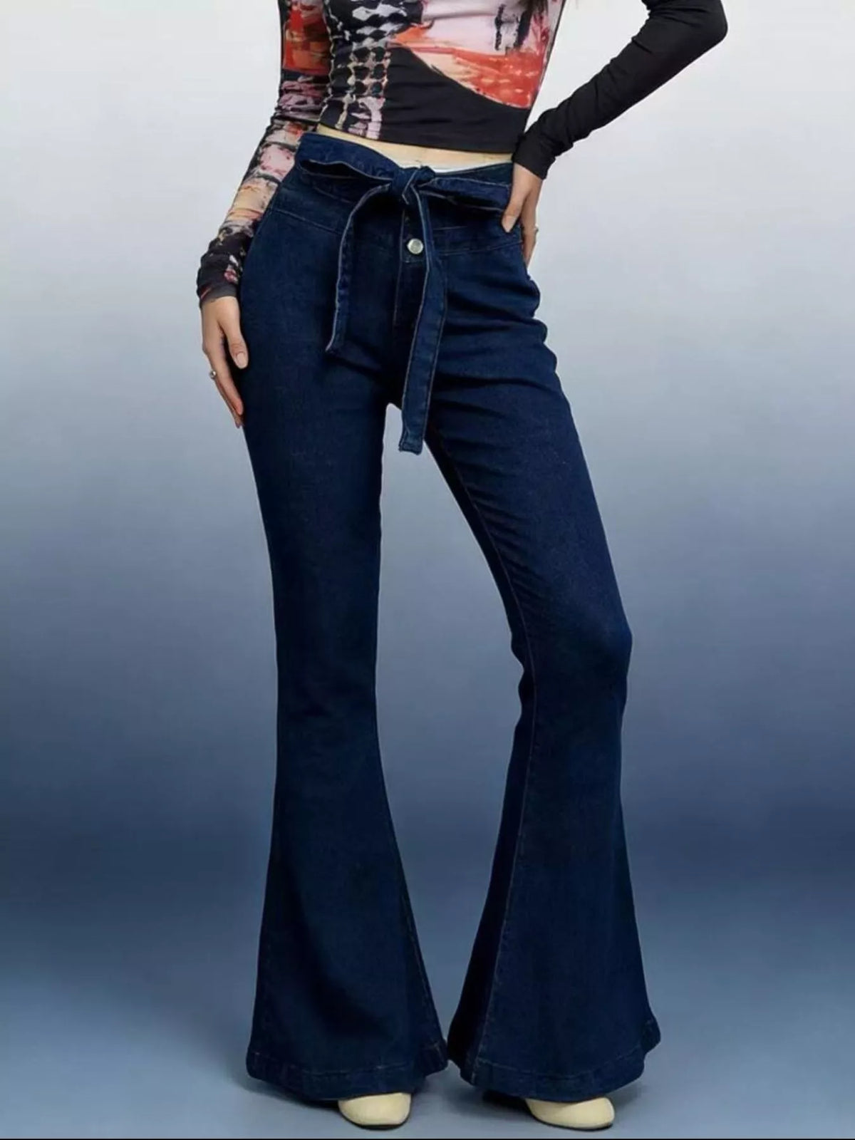 Bow tie flare jeans styled with heels