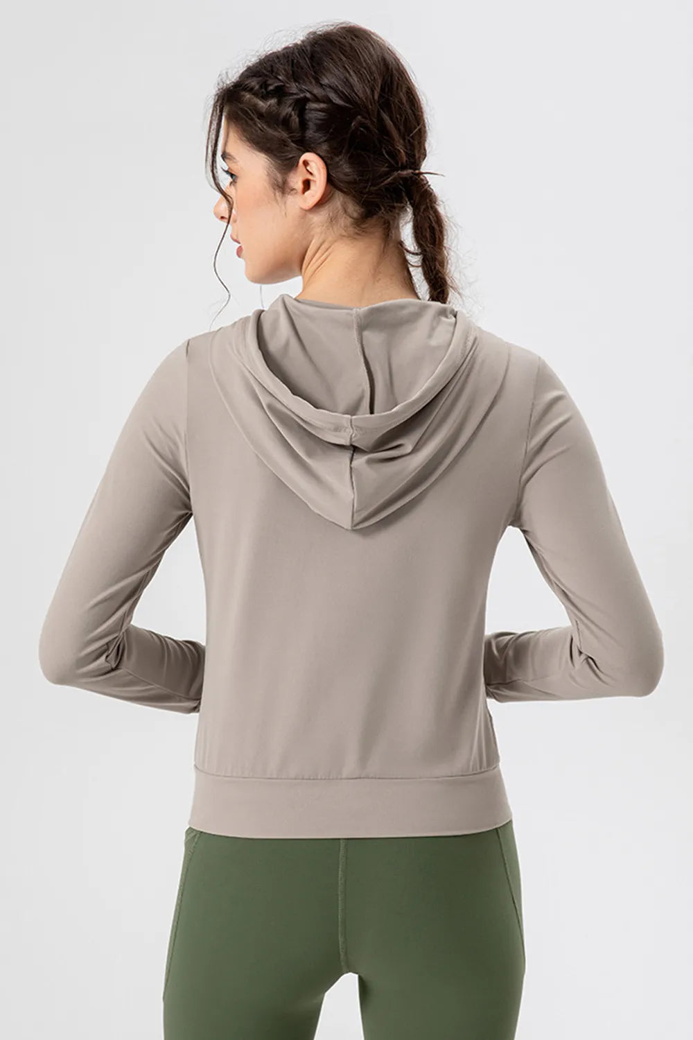 Active jacket styled over leggings