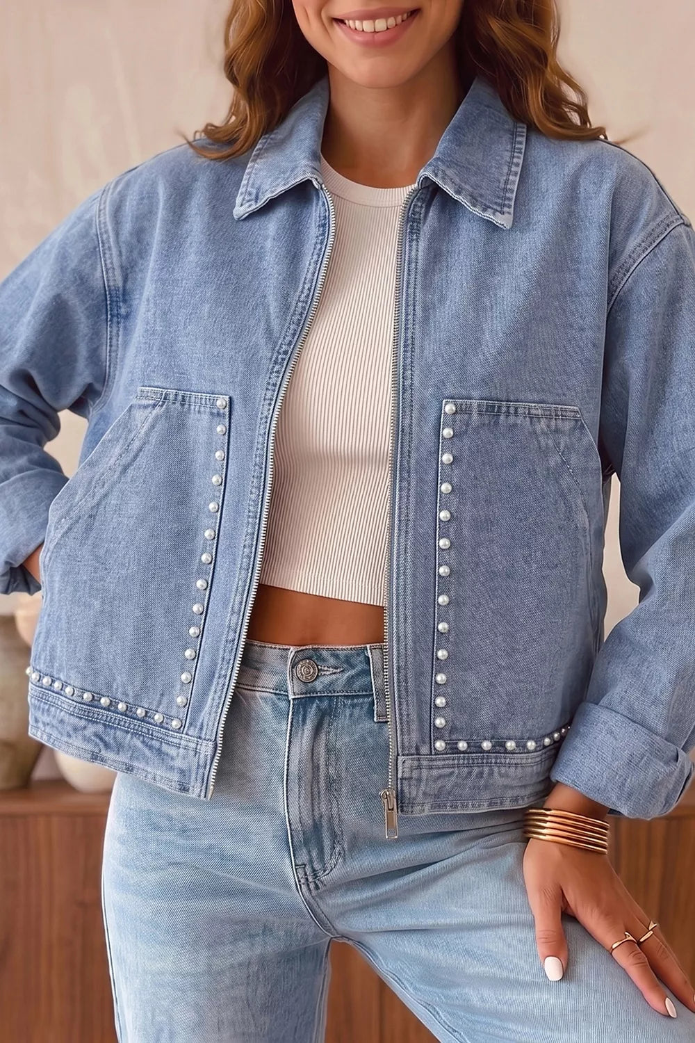 Close up of the studs and metal rivets on the denim jacket
