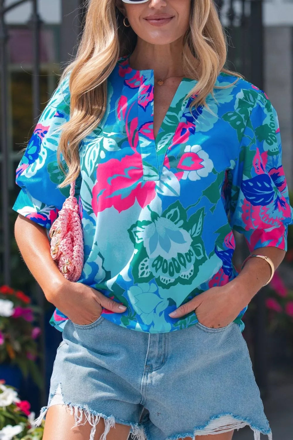 Pastel blue floral blouse sleeve detail