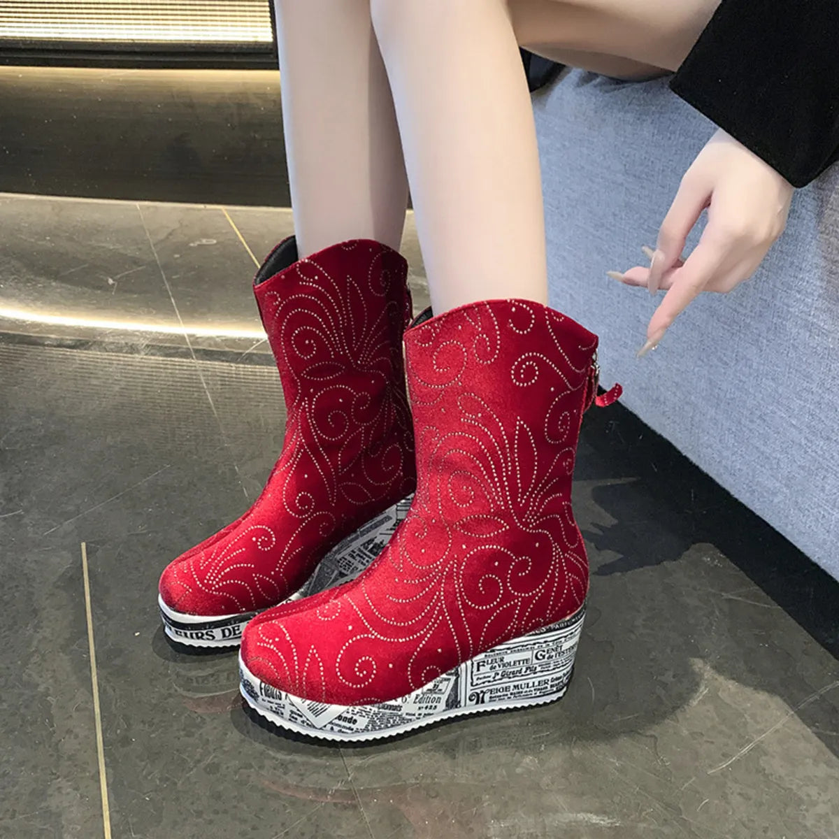 Round toe platform wedge boots heel and sole detail
