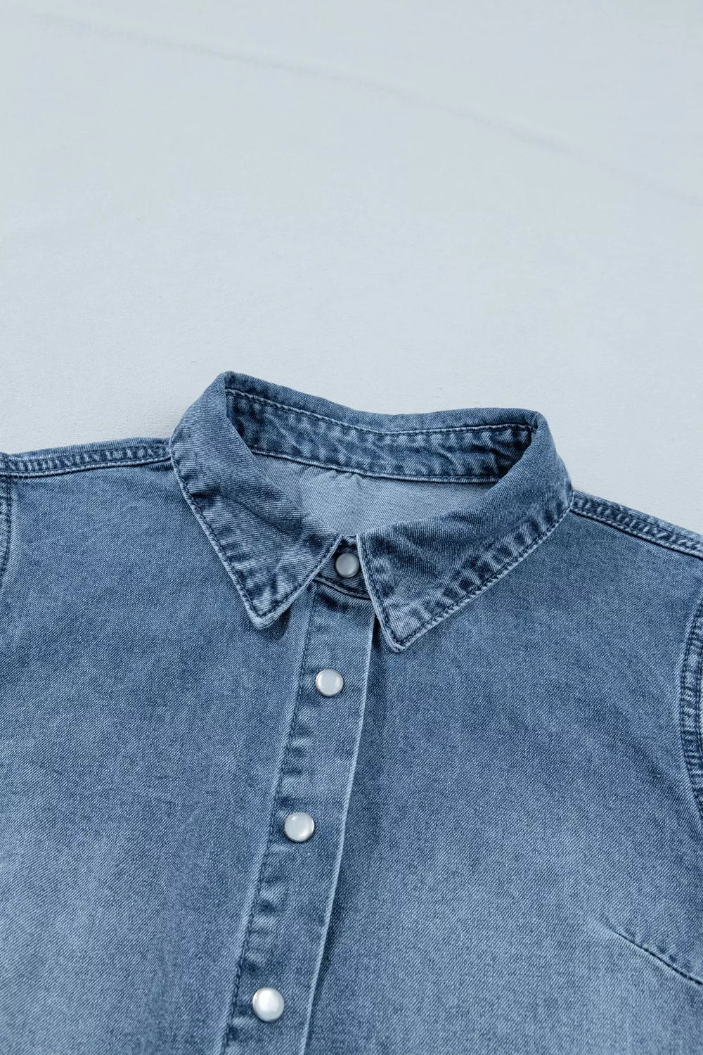 Medium wash frilled snap button denim shirt full length view
