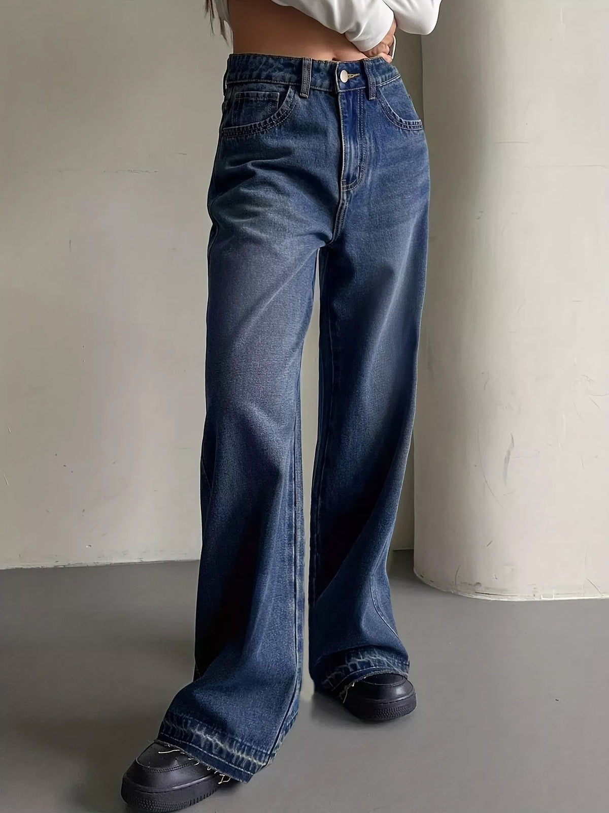 Blue vintage washed wide leg jeans front view