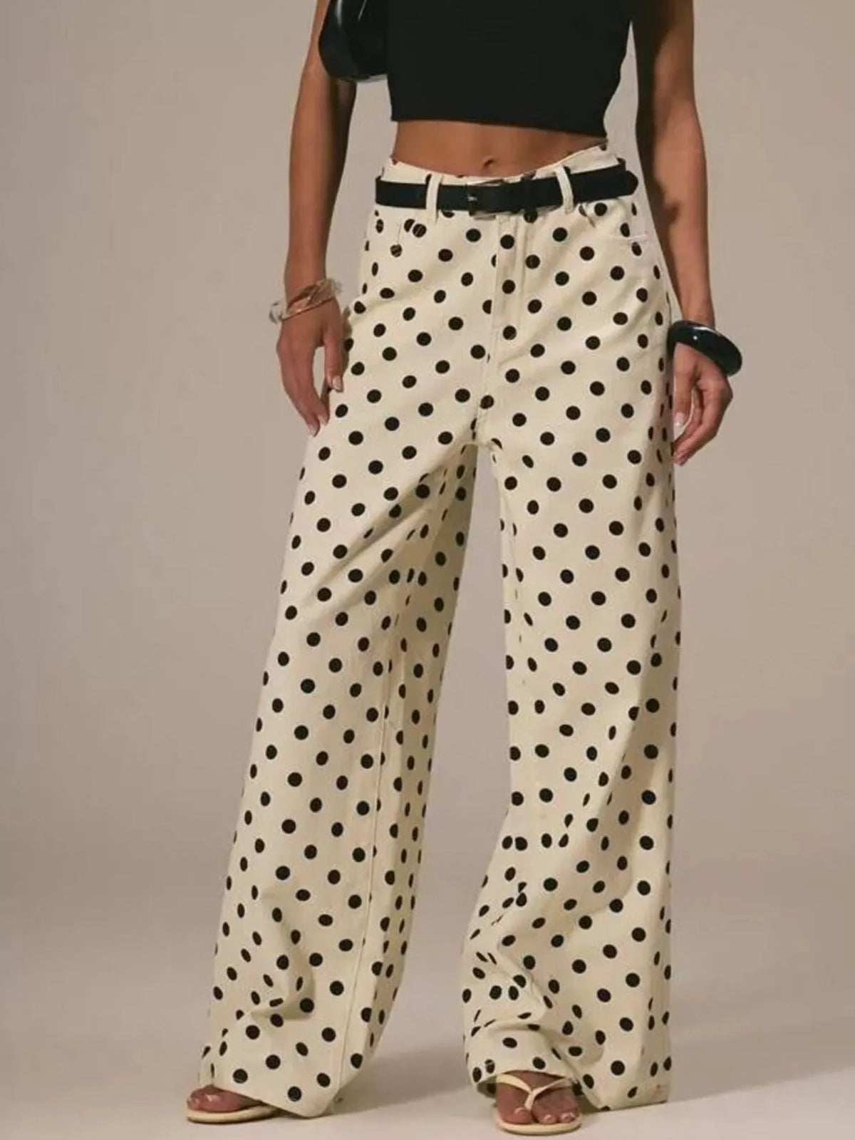 Pastel polka dot jeans styled full length