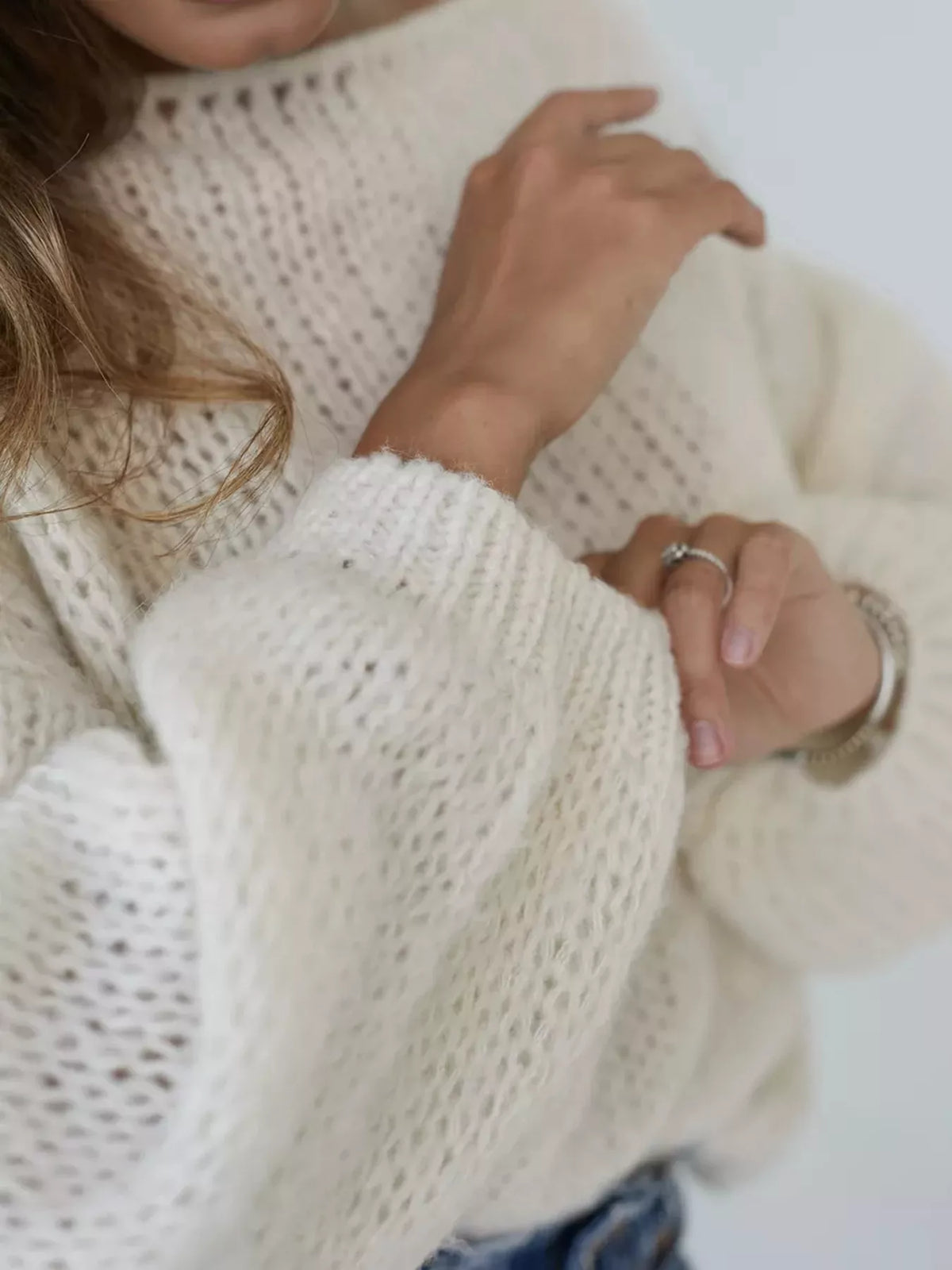 Soft oversized boat neck sweater close up