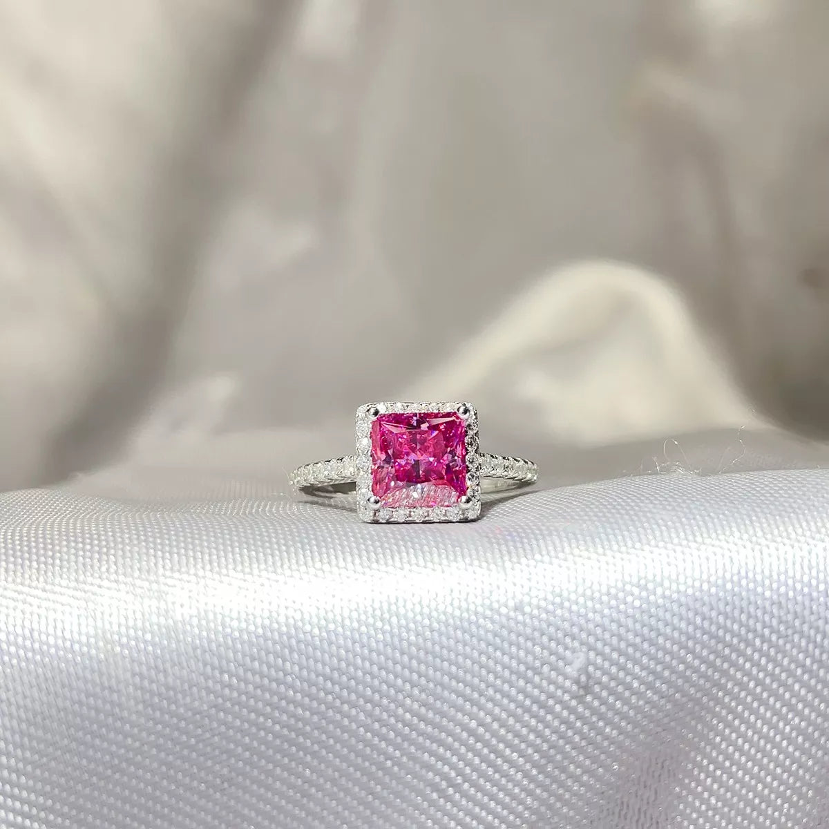 Close up of the soft pink moissanite stone