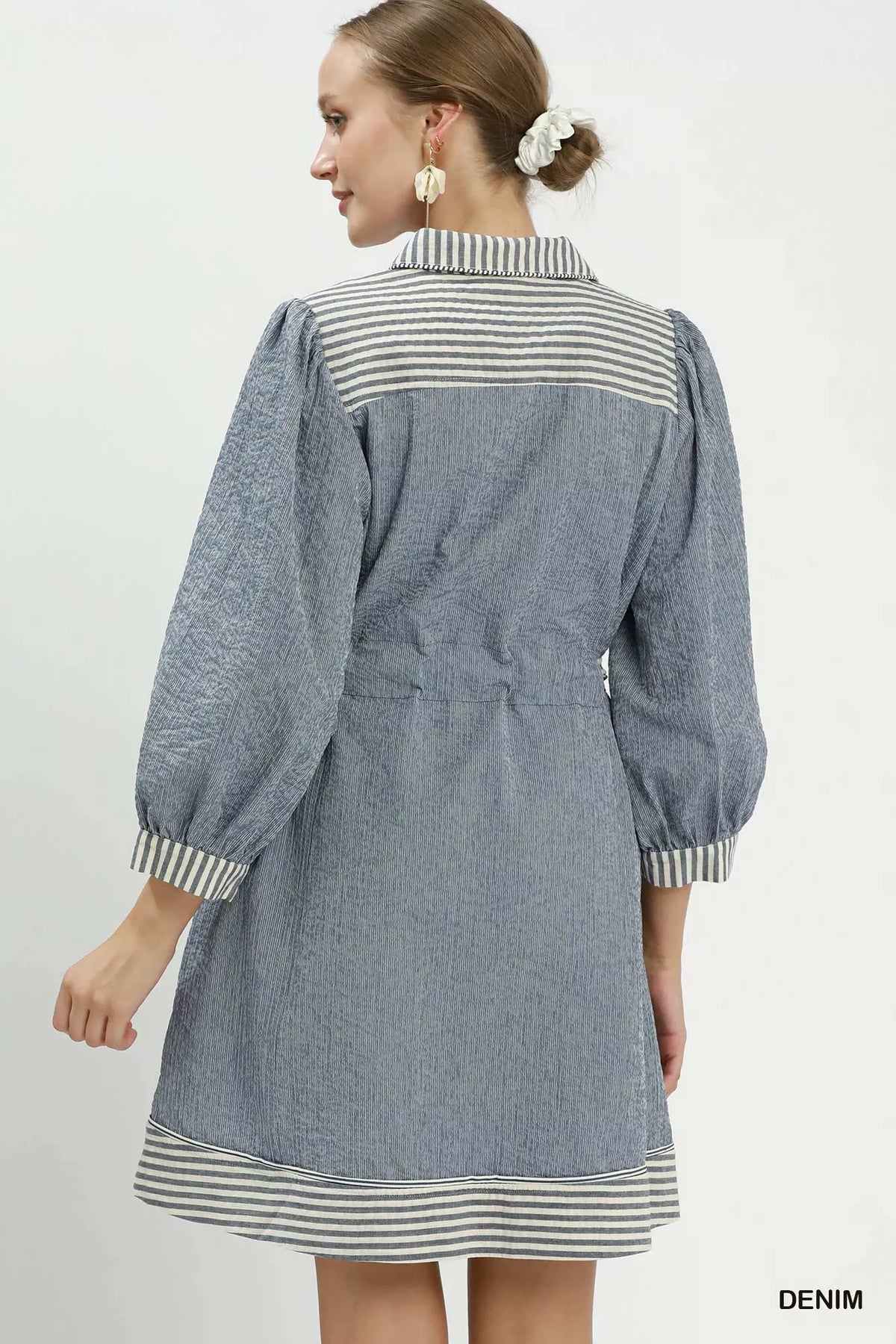 Contrast waist belt detail on striped dress