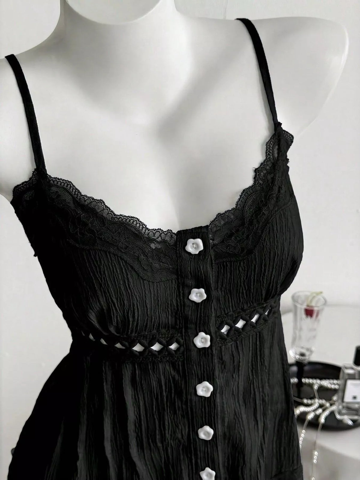Camisole with lace trim shown from the side