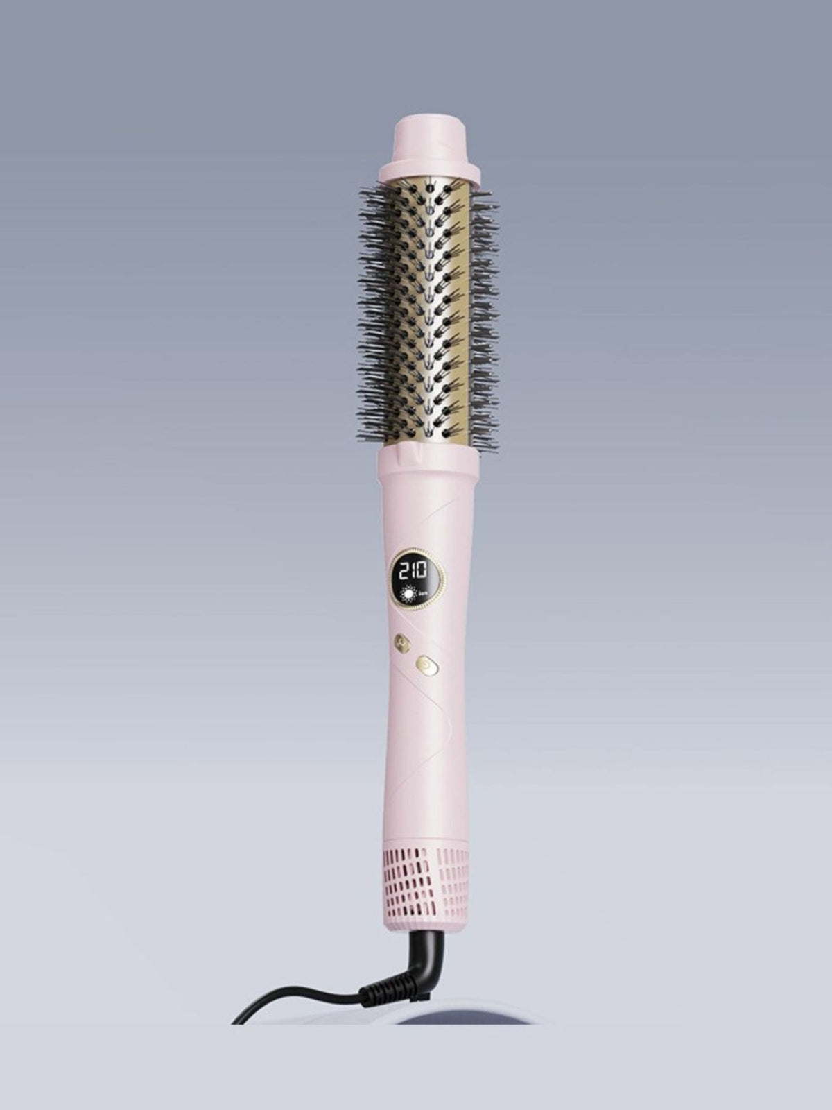 Hot air brush held in hand