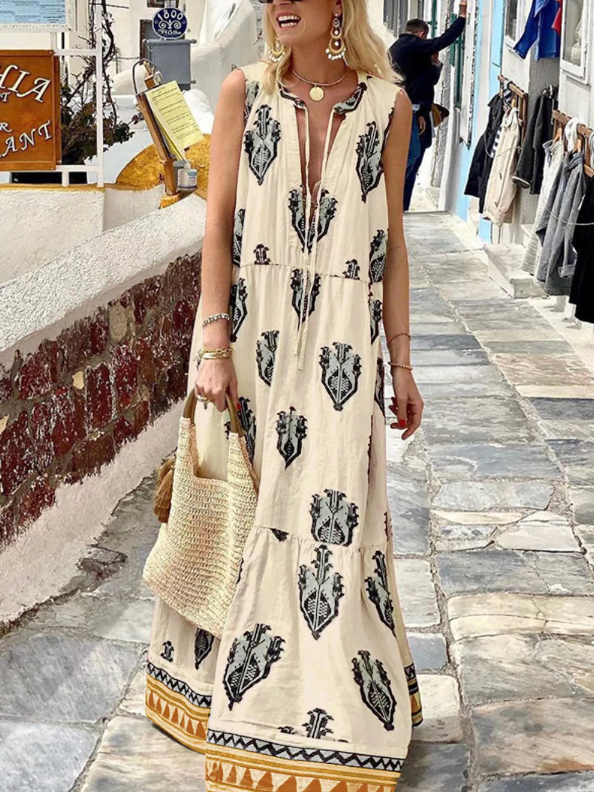 Printed sleeveless tiered maxi dress, front view