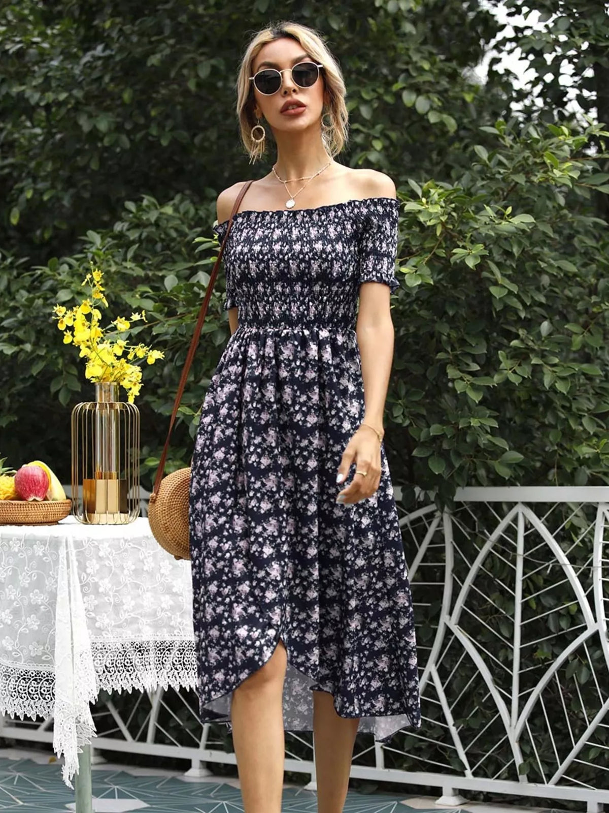 Smocked body detail on the off shoulder floral dress
