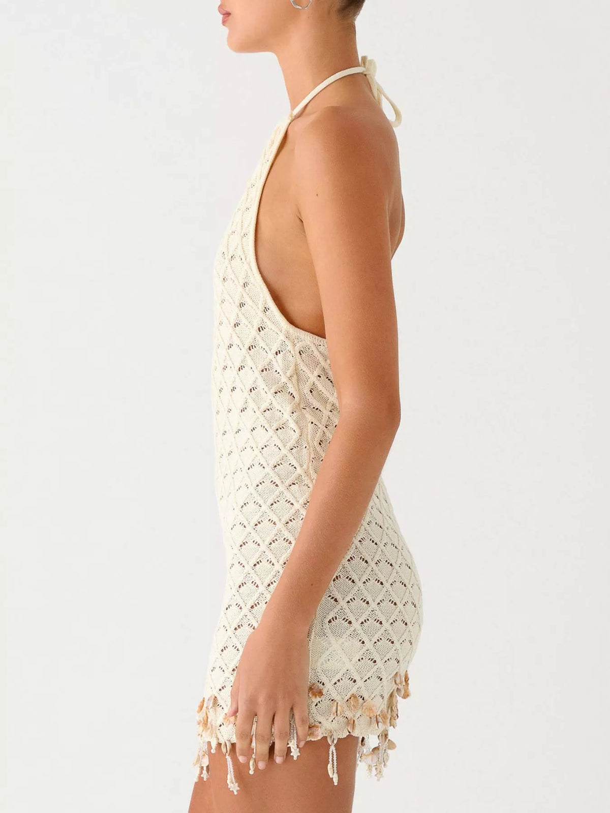 Openwork mini dress shown from the side