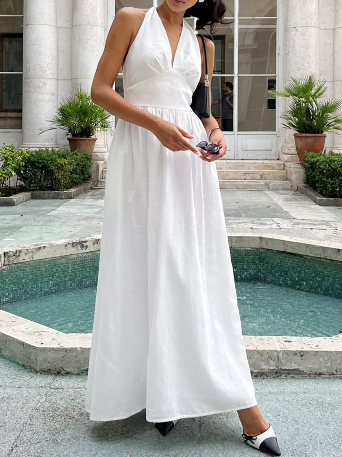 white halter neck tied flowy maxi dress front view