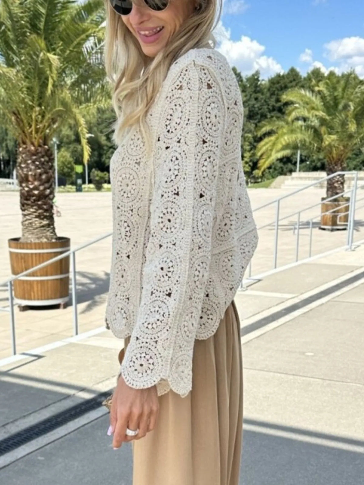 Apricot crochet top styled with jeans