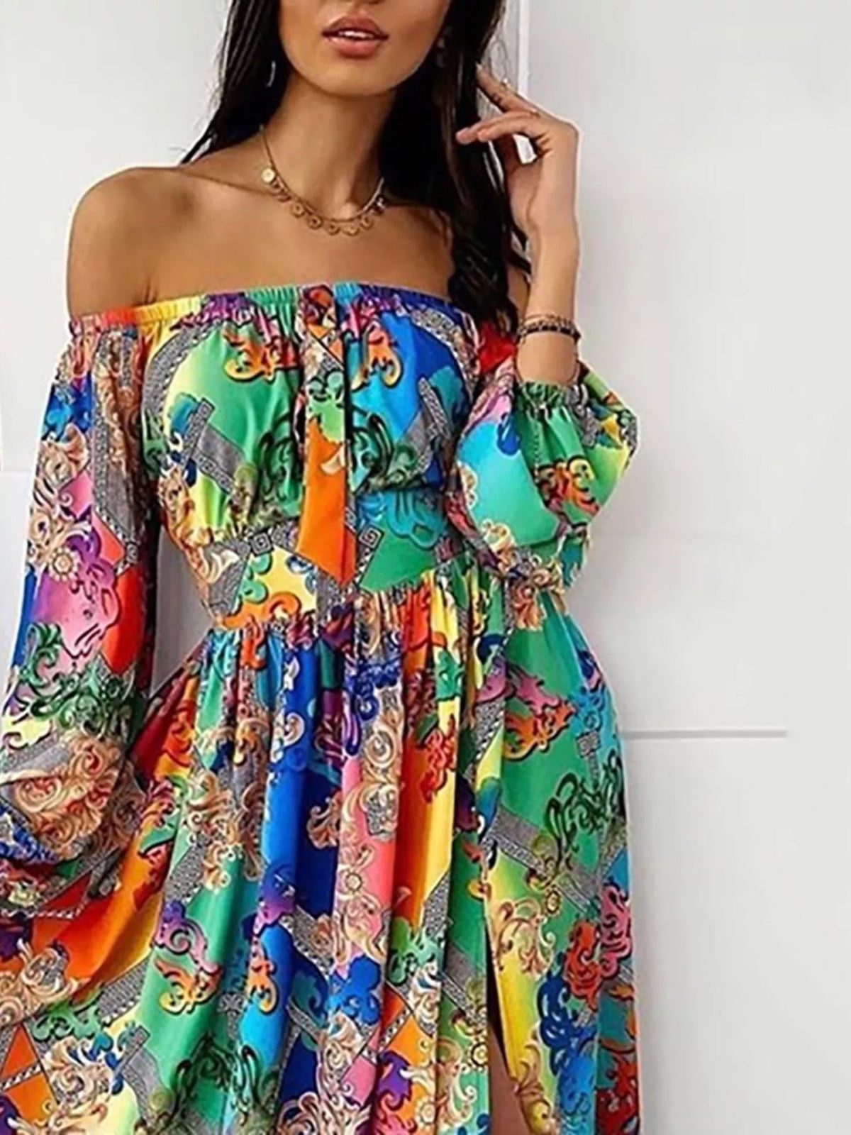 Front view of the printed off shoulder maxi dress