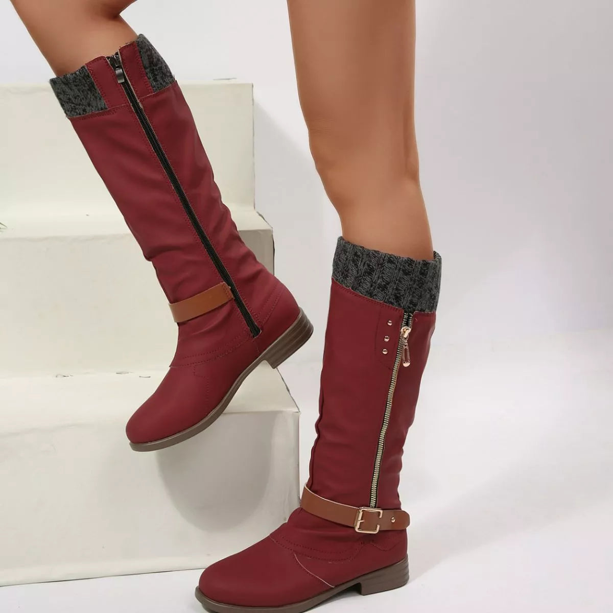 Brown round toe block heels boots pair standing together