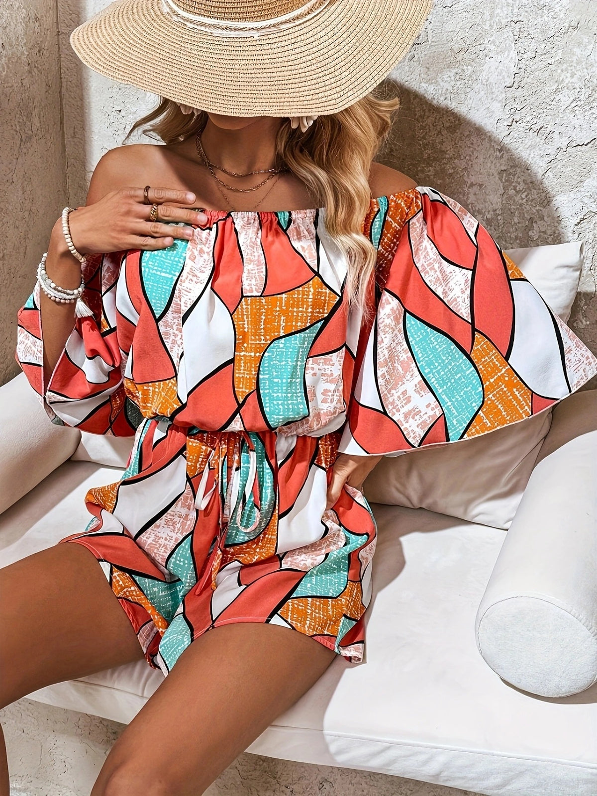Full length vacation look with the orange romper