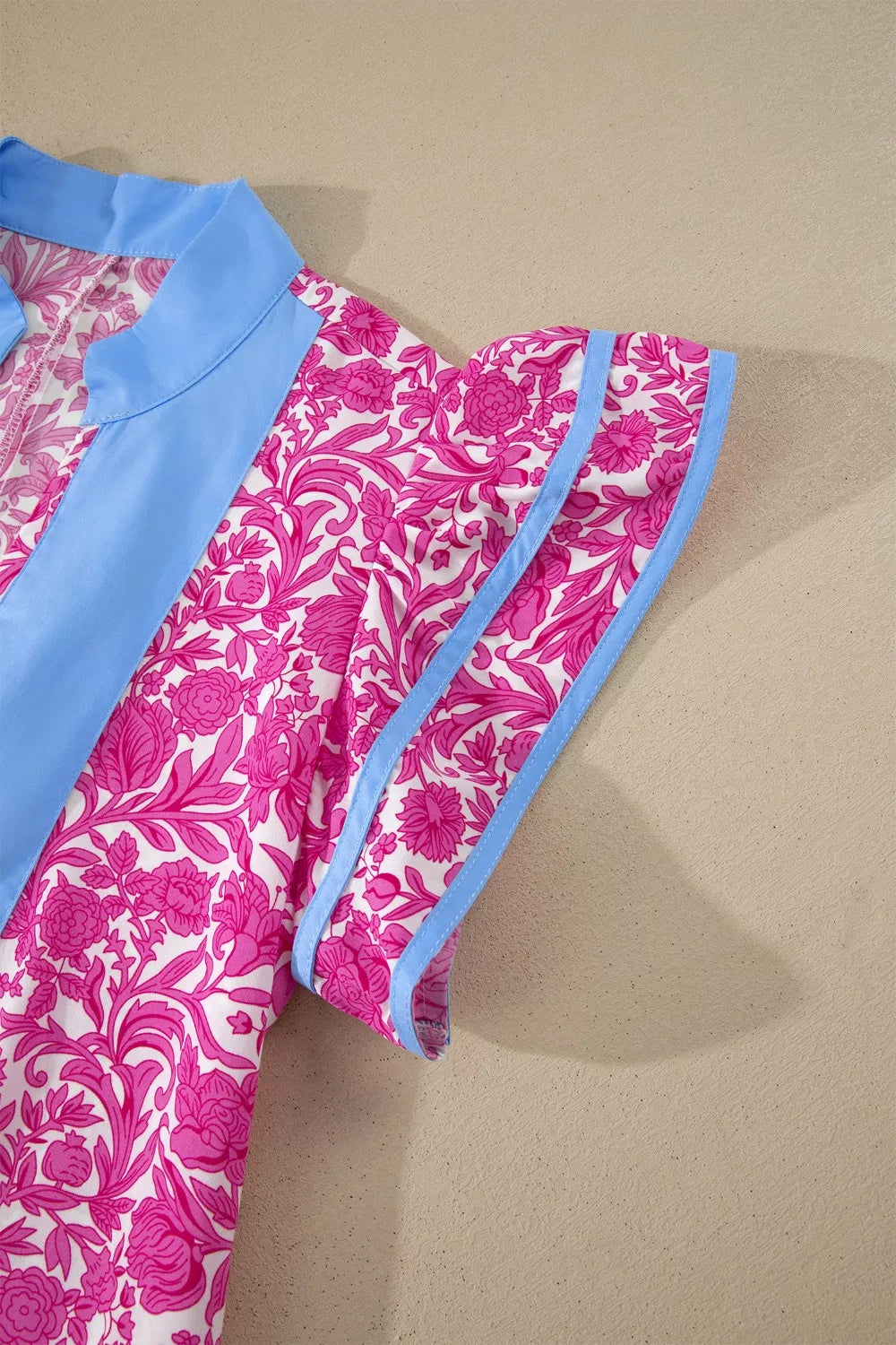Pink floral ruffle cap sleeve maxi dress detail view
