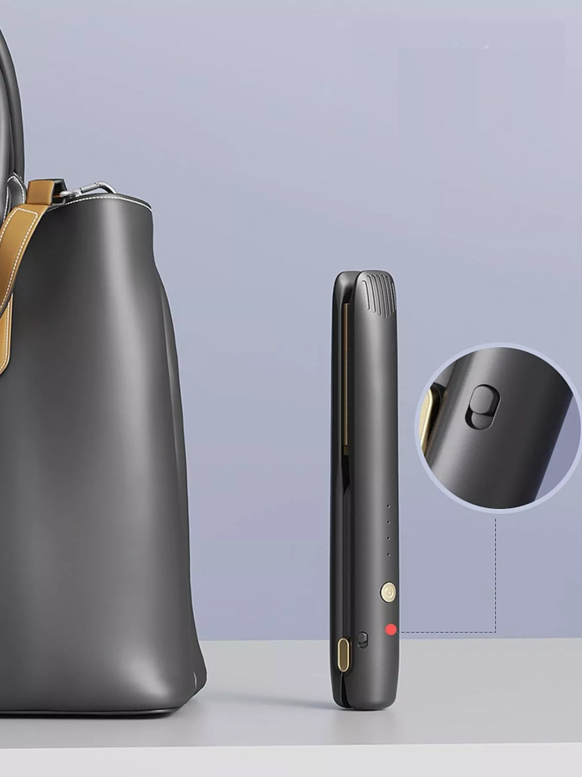 Straightener held in hand