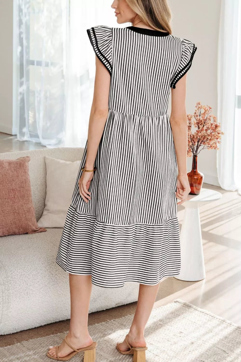 Tiered dress ruffle sleeve detail