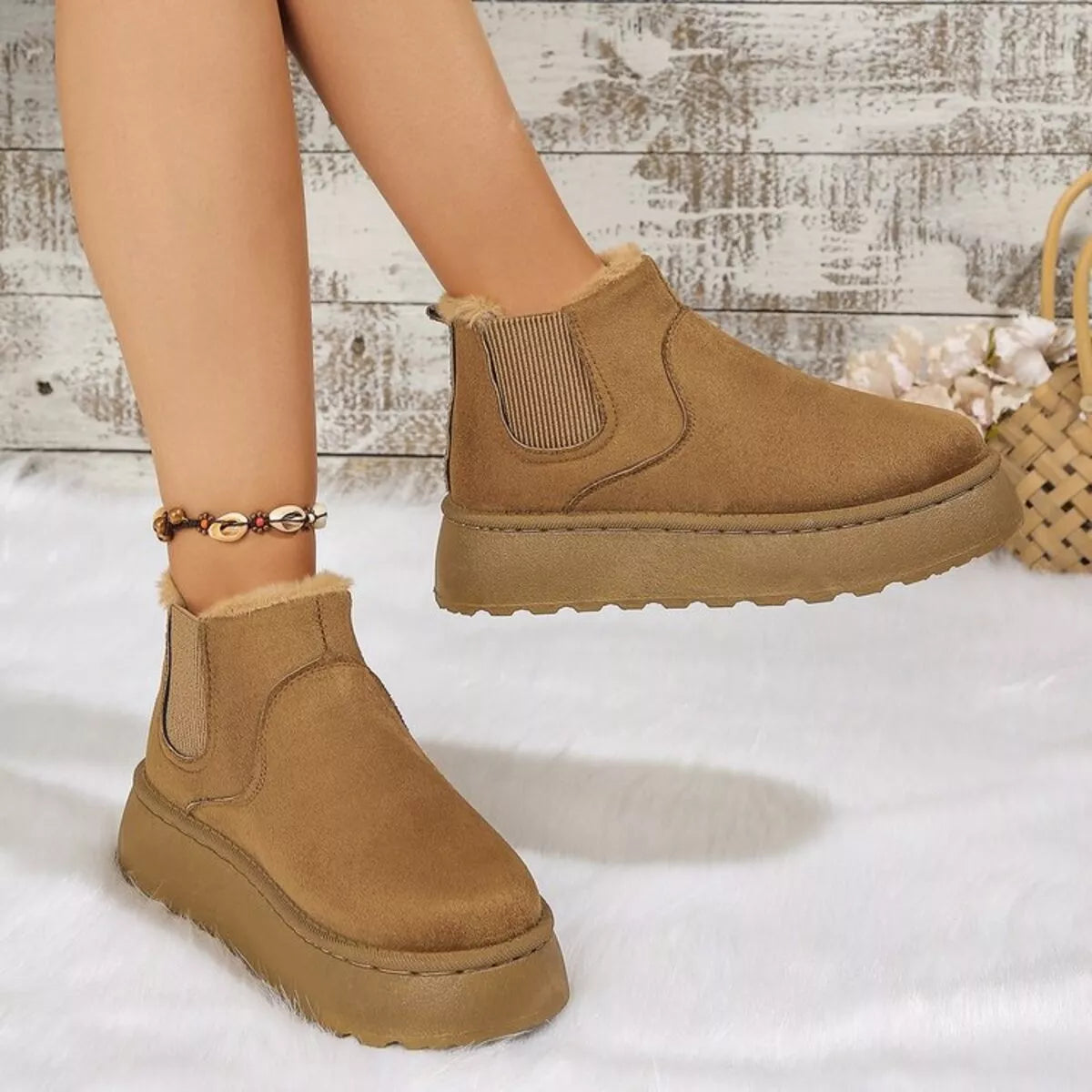 Round toe platform ankle boots worn on model