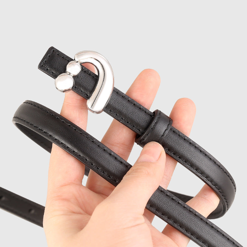 Silver buckle skinny leather belt front view