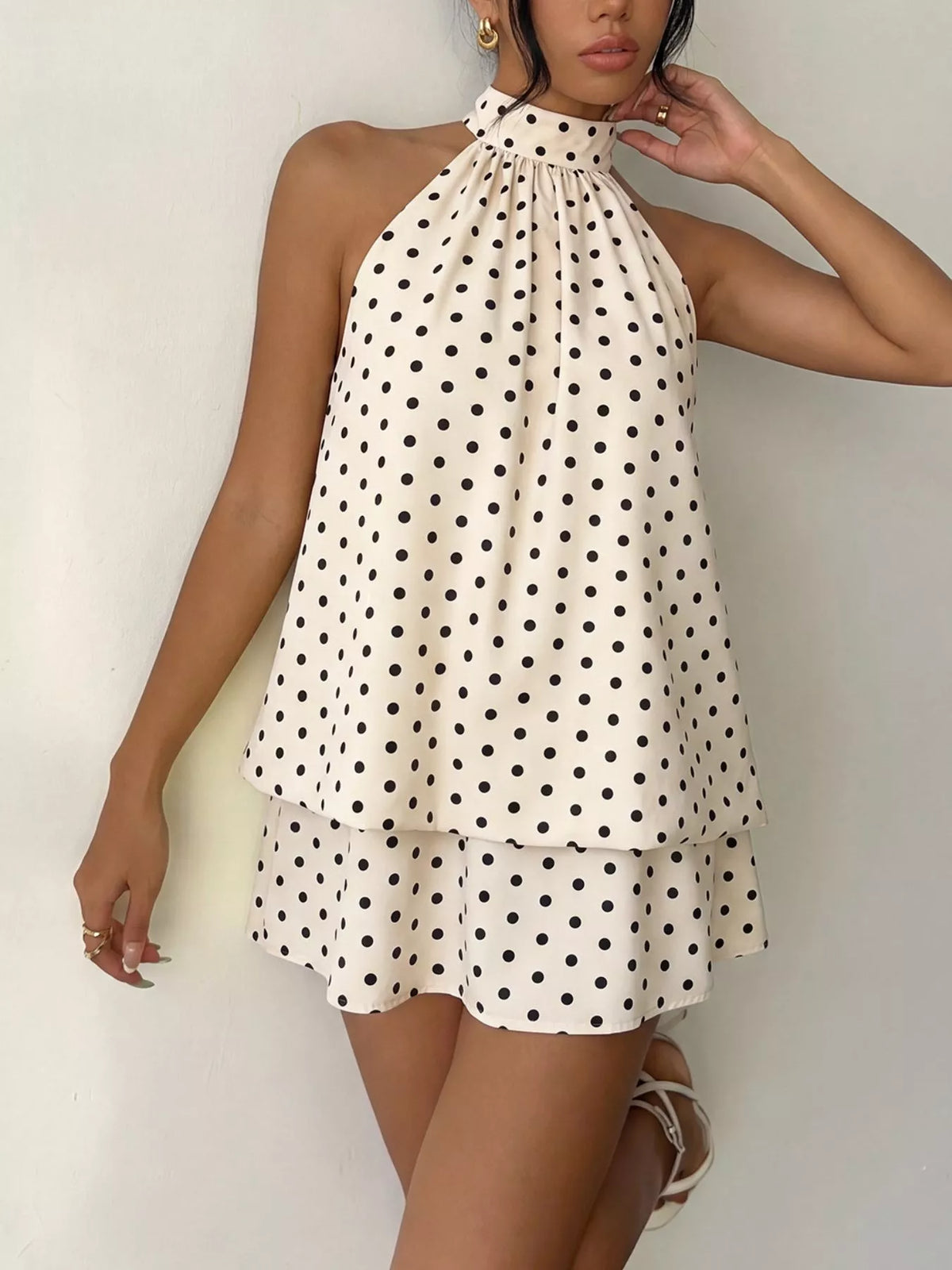 Detail of halter tie neckline on polka dot dress