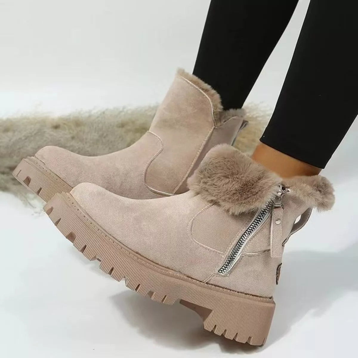 Fuzzy lined suede ankle boots pair styled together