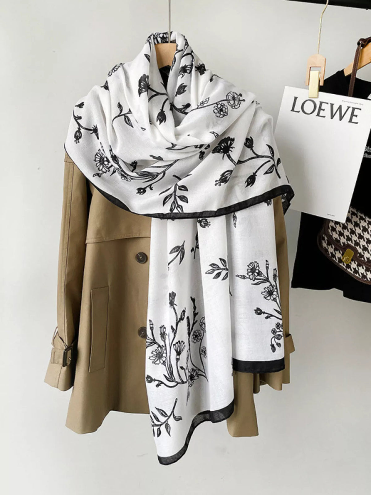 Floral scarf styled over a spring blouse