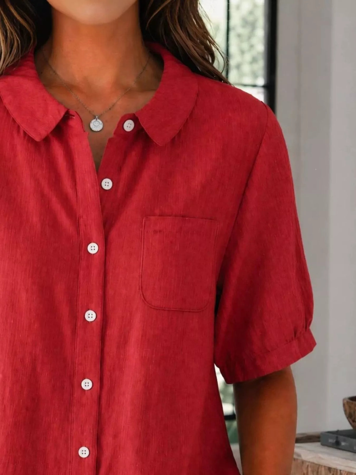 Detail of the short sleeve hem and shoulder seam
