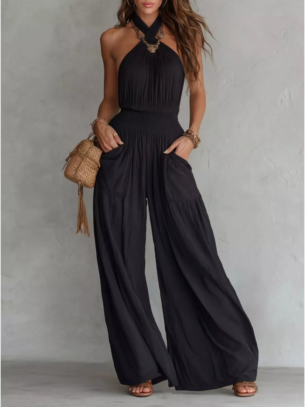Halter neck wide leg jumpsuit fabric detail