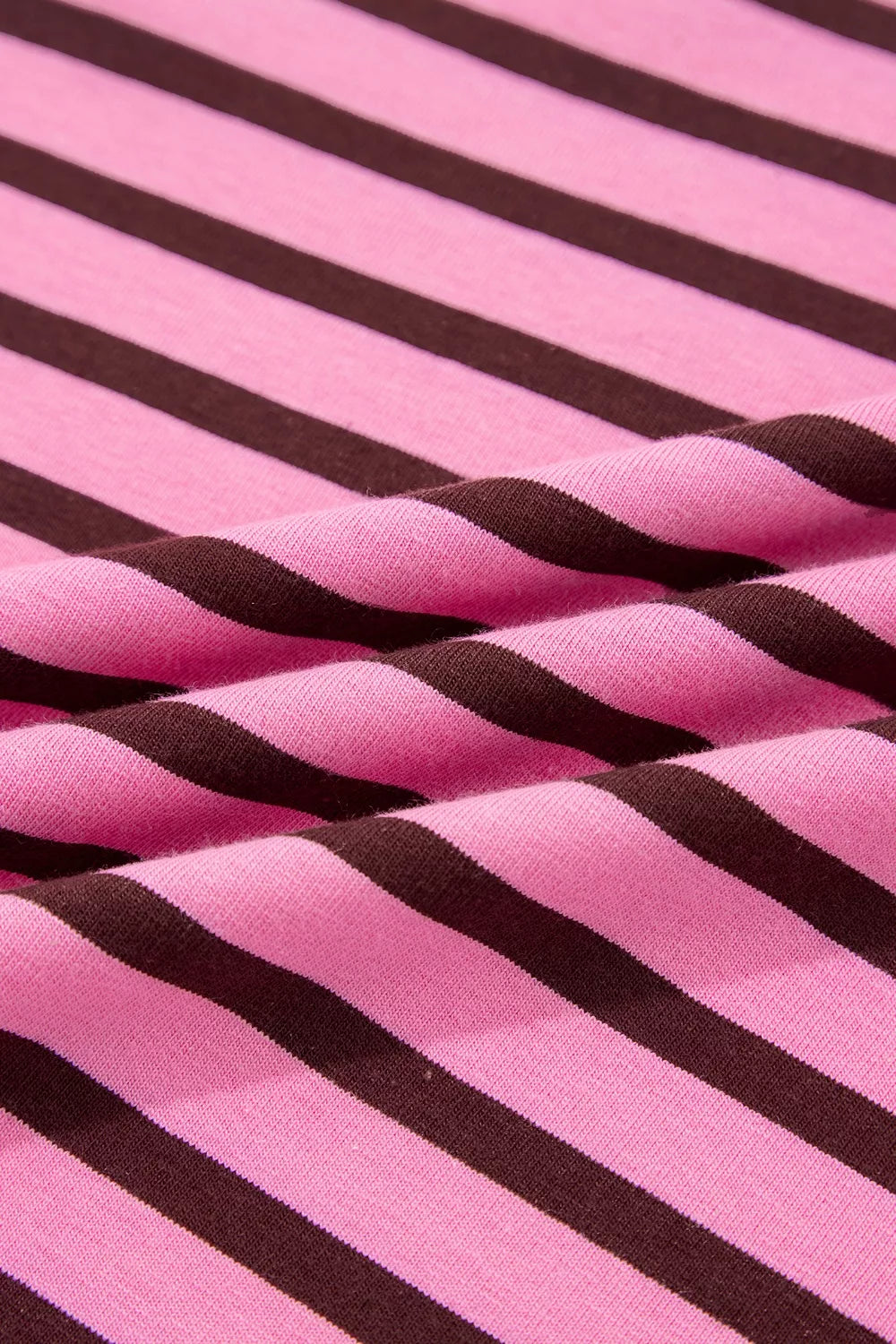 Flat lay of the striped v neck drop shoulder top