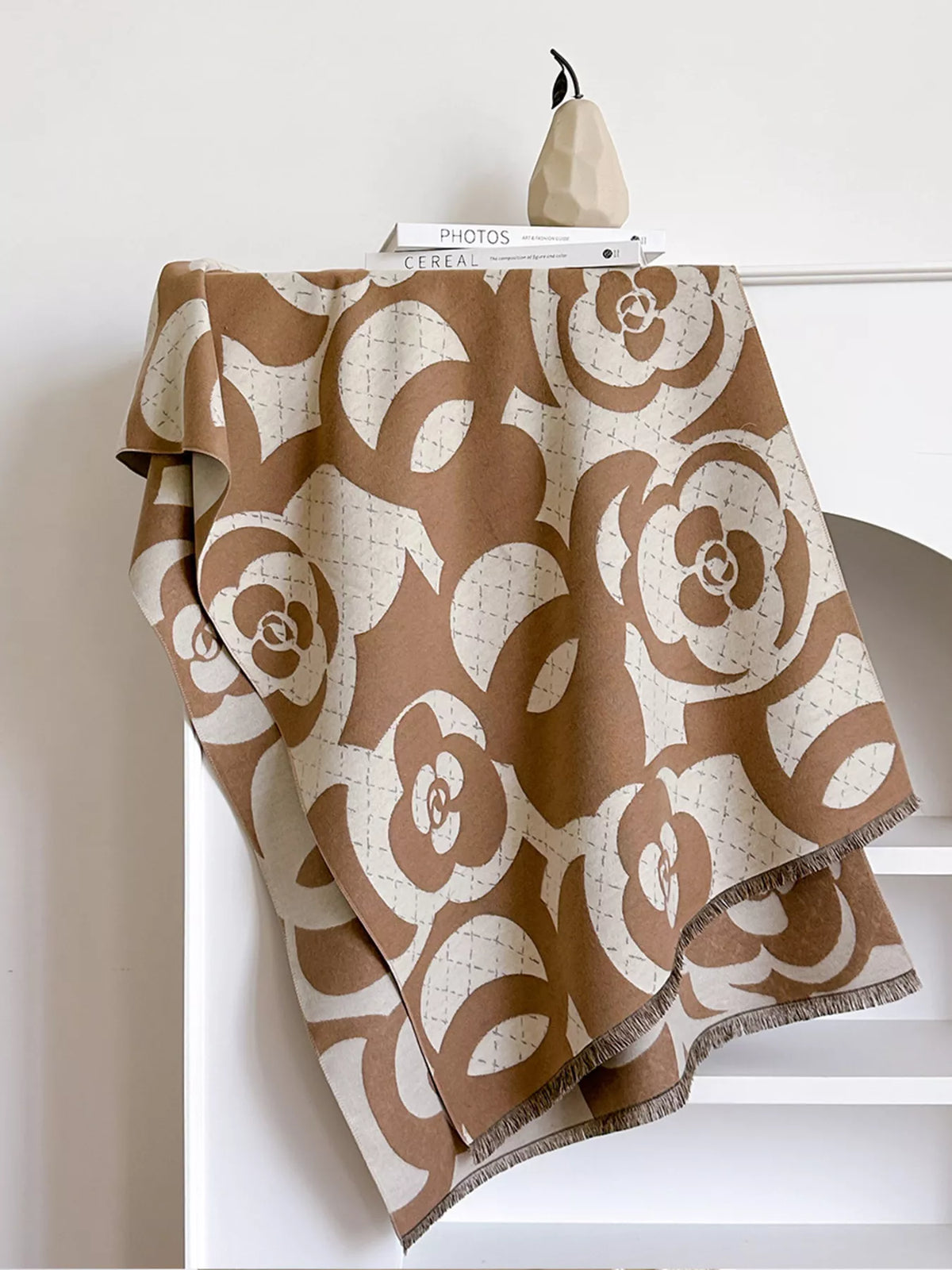 Floral scarf looped for a plush layered look