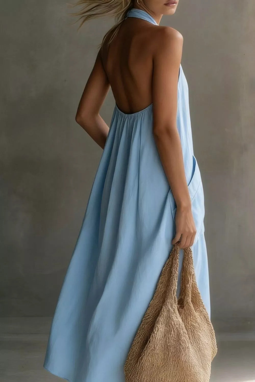 Halter neck pocket midi dress, side view