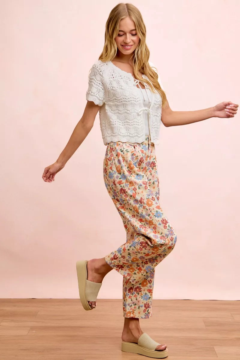 Flat lay of the cream multi floral twill barrel pants