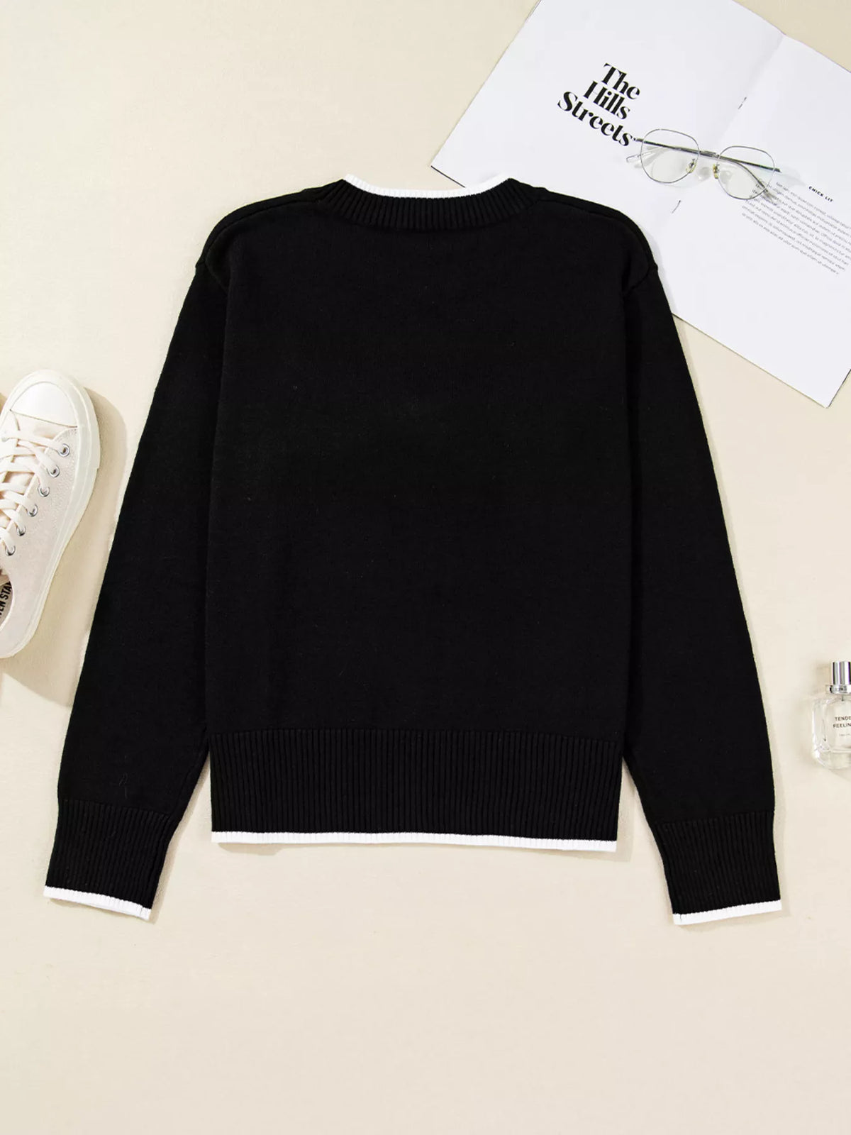 bow cropped sweater neckline detail