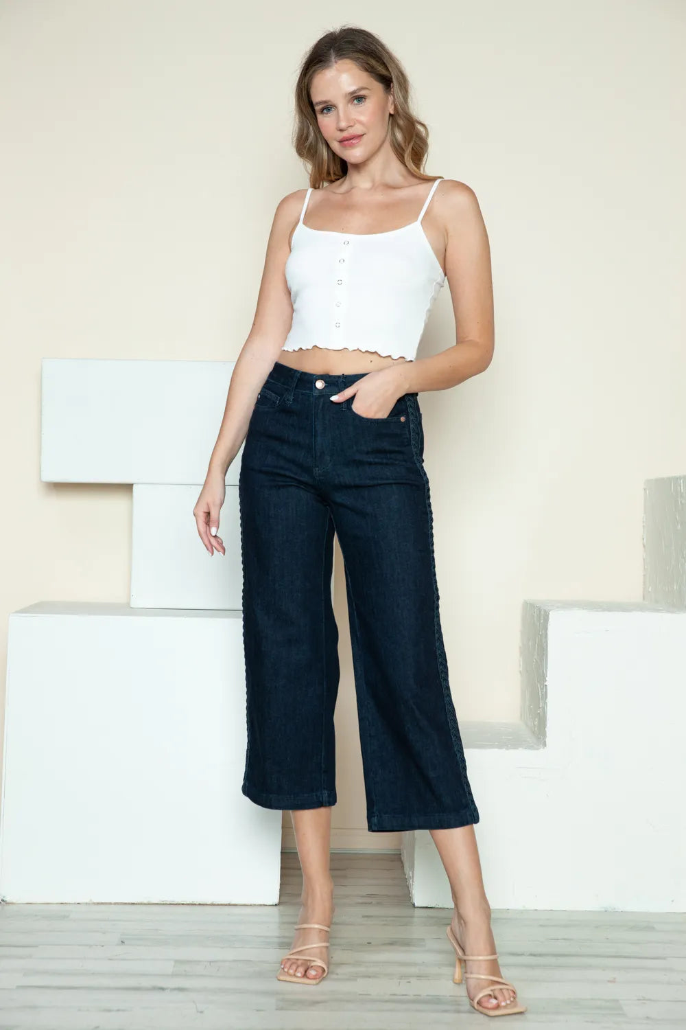 Braid detail crop jeans styled with a casual blouse