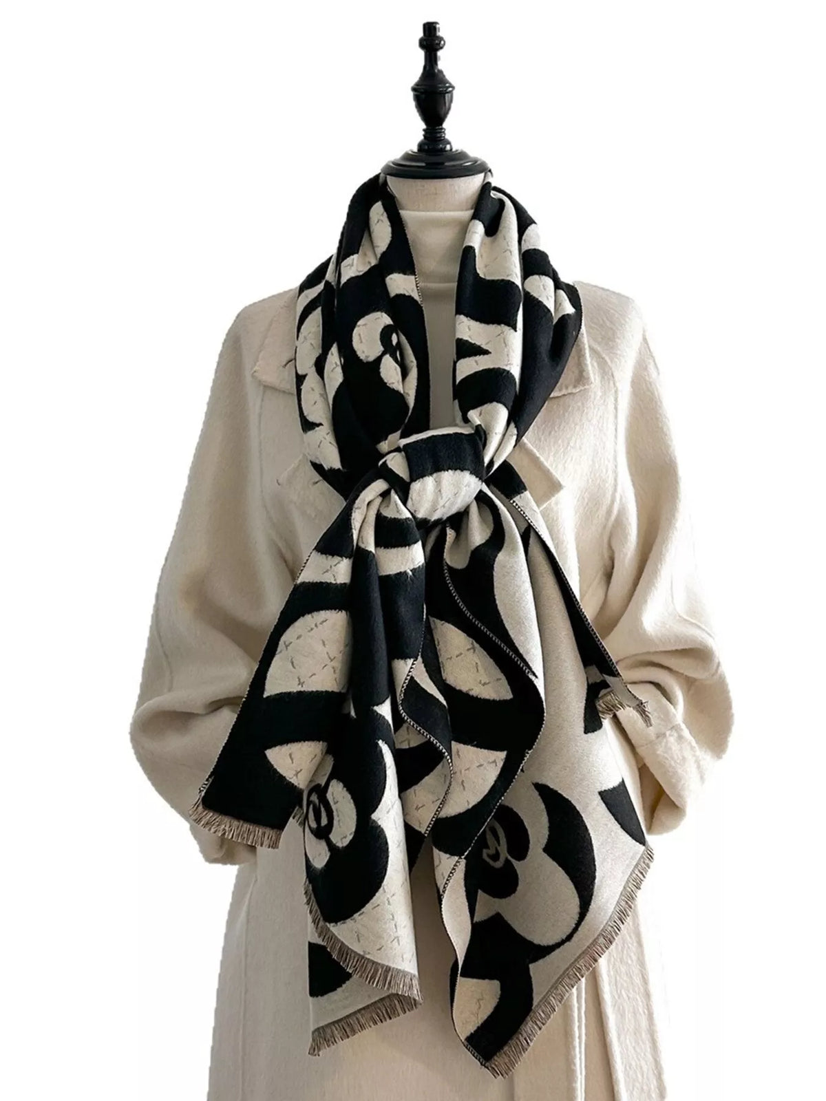 Warm floral scarf draped for an evening look