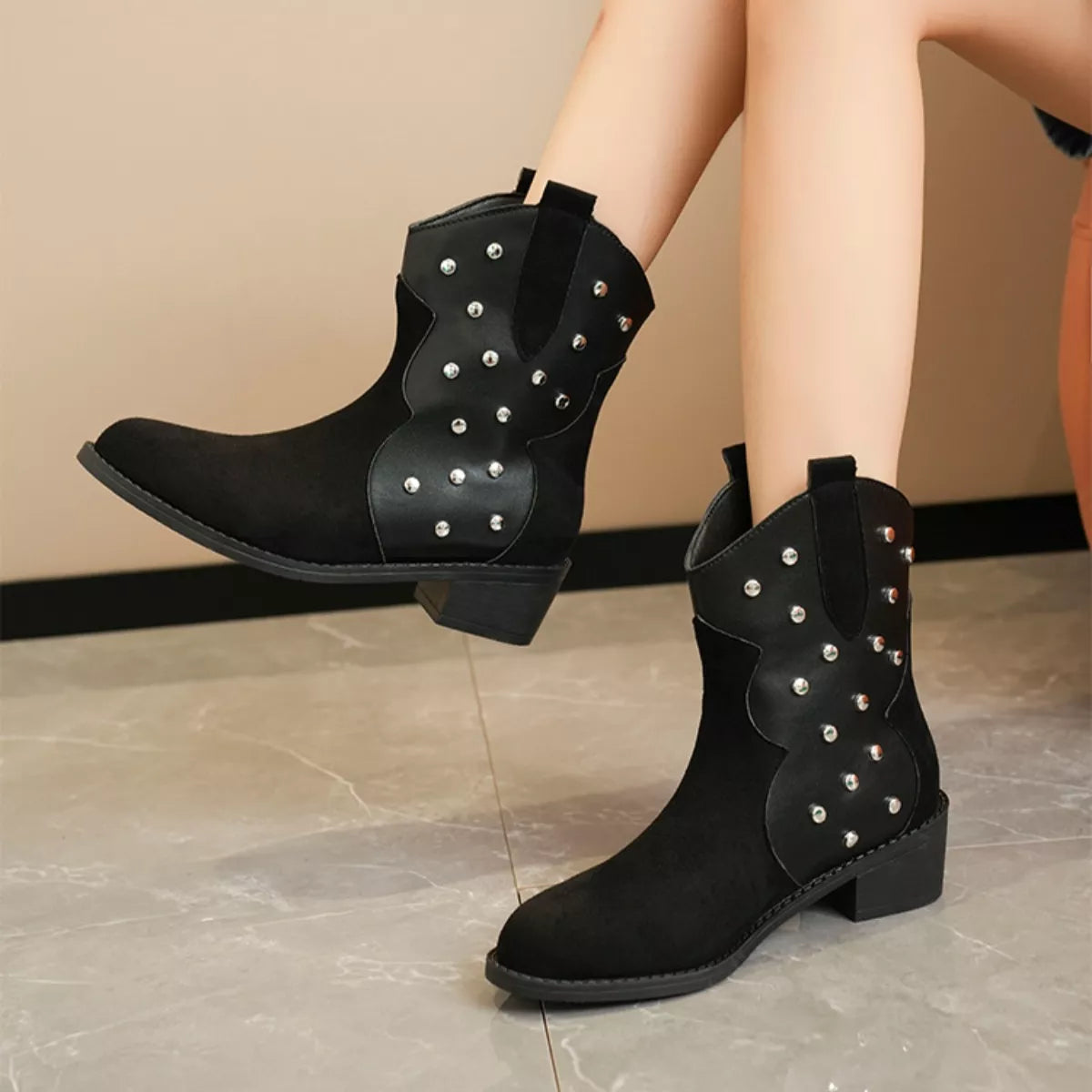 Studded western ankle boots front view