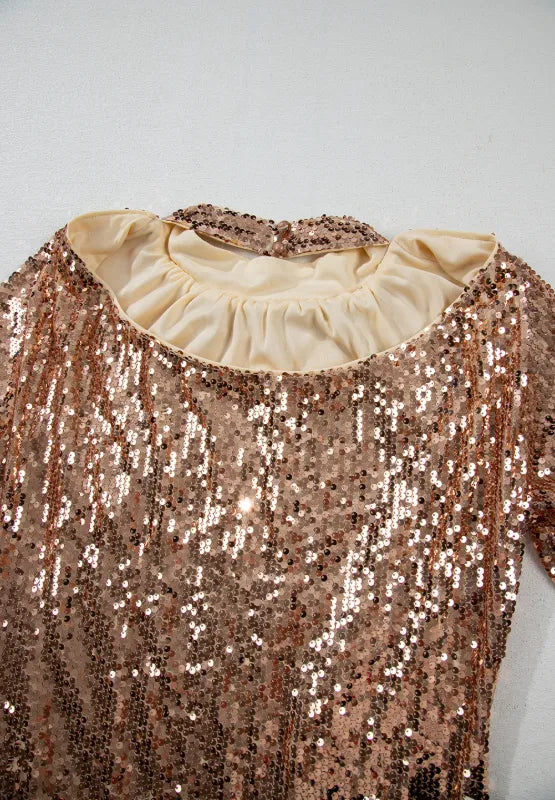 Backless gold mini dress styled look