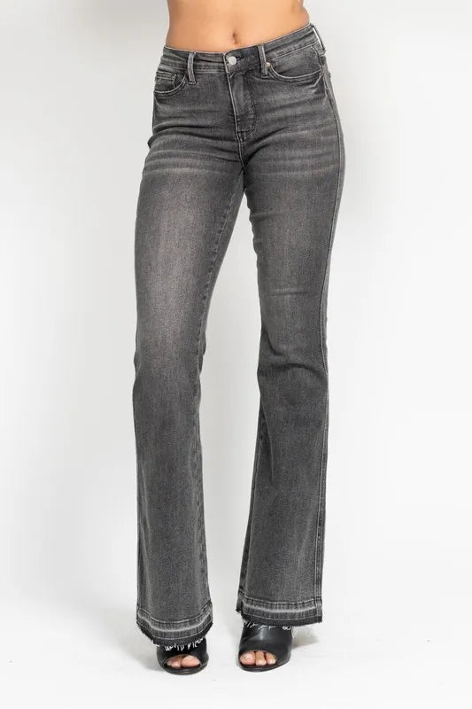 Mid rise gray denim side profile with flare leg
