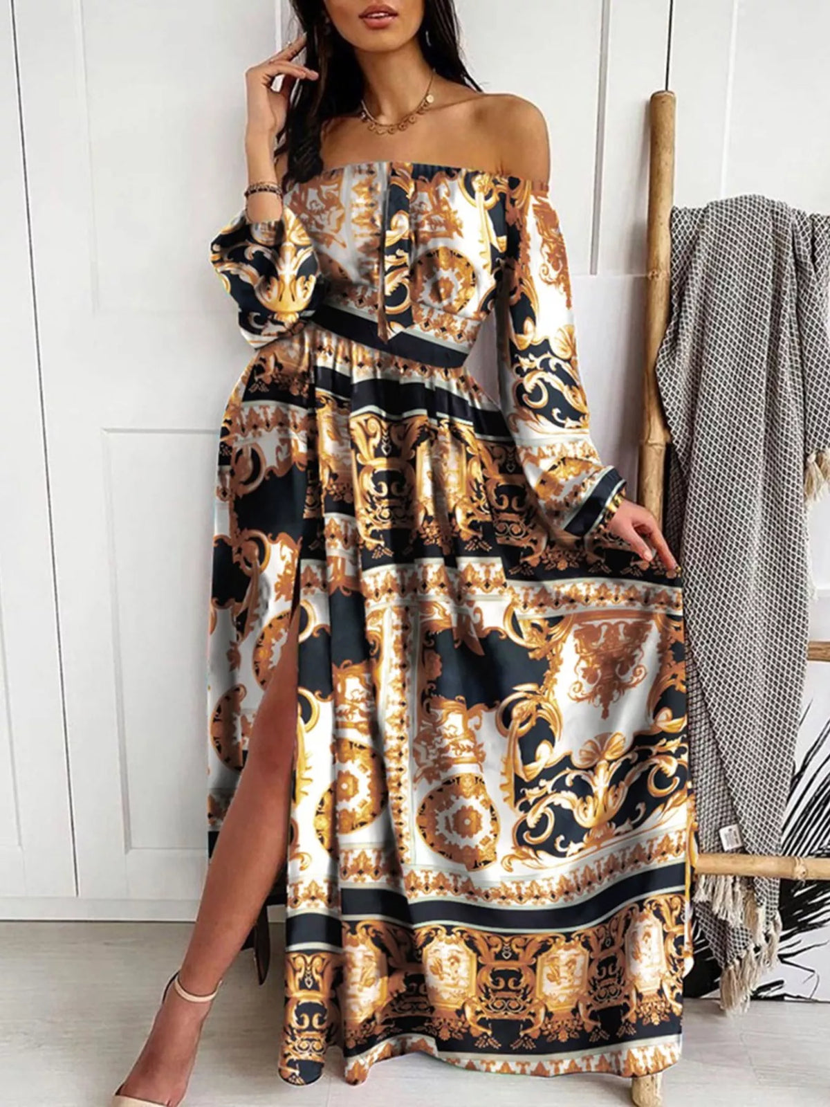 Full length view of the printed off shoulder maxi dress