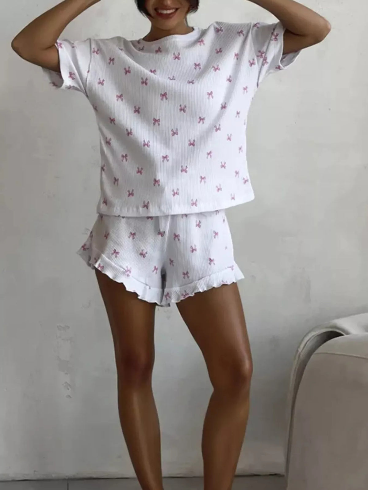 Ribbed knit top bow print detail