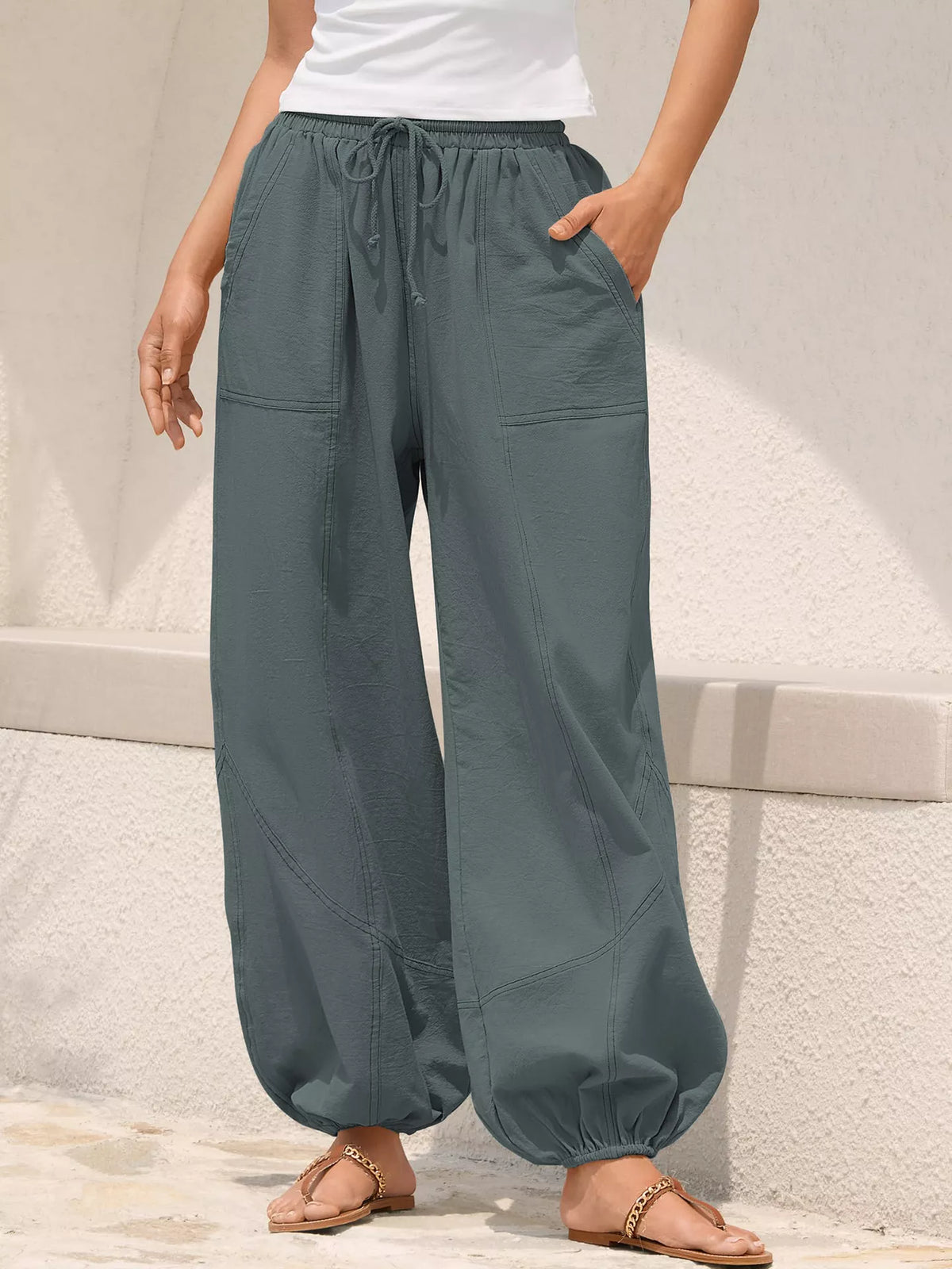 Loose fit drawstring waist harem joggers front view