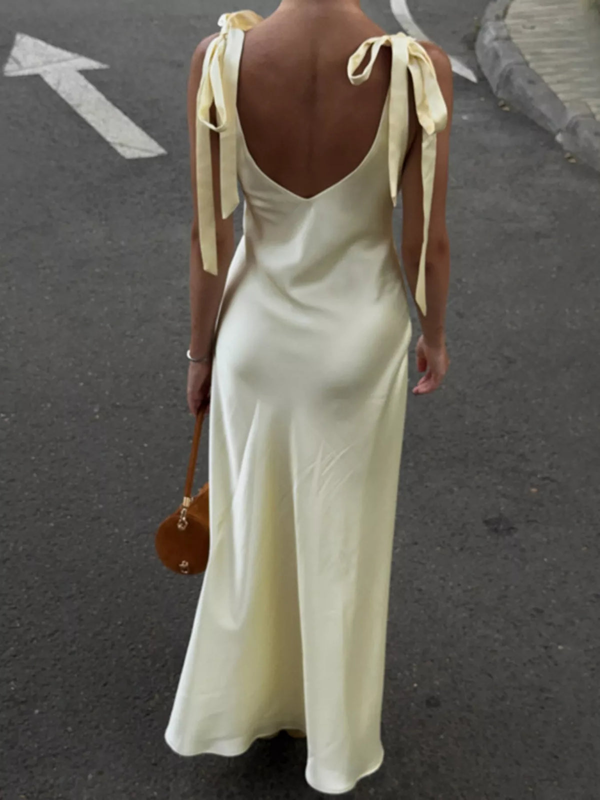 Tie shoulder strap detail on the long satin dress