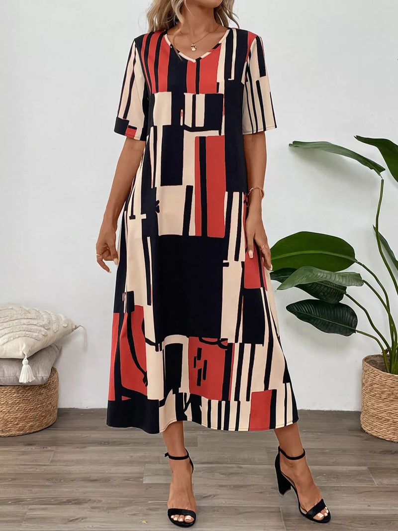 Abstract geometric print v neck midi dress front view